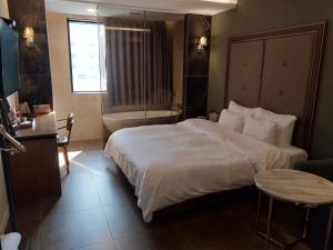 Postel nebo postele na pokoji v ubytování Brown Dot Hotel Busan Station