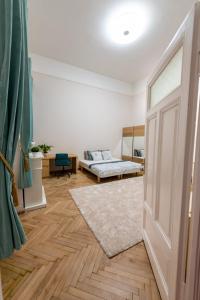 Cama o camas de una habitación en OASIS Guest House Budapest