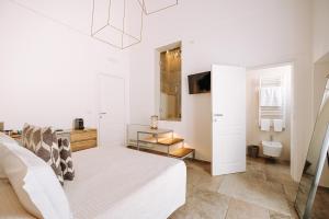 Posteľ alebo postele v izbe v ubytovaní Suite1212 - Pirrelli