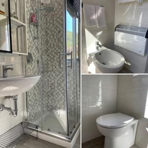 La salle de bains est pourvue de toilettes, d'un lavabo et d'une douche. dans l'établissement La casina di Francy, à Castelsantangelo sul Nera