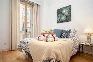 Posteľ alebo postele v izbe v ubytovaní -MalagaSunApts- Soho Magic Art&Vibes