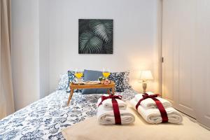 Posteľ alebo postele v izbe v ubytovaní -MalagaSunApts- Soho Magic Art&Vibes