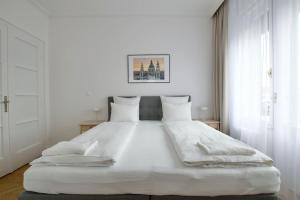 Postel nebo postele na pokoji v ubytování Premium Apartment by Hi - Central 2 BR - best view