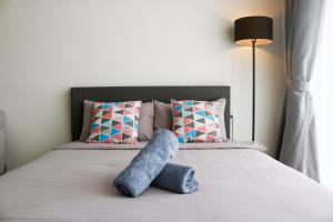 Postel nebo postele na pokoji v ubytování Lavish Beacon Executive Suites by Bin Dao Wu Homestay Penang + 29 fotografií
