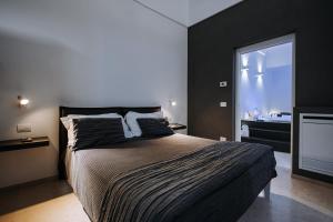Postel nebo postele na pokoji v ubytování Suite1212 - Rattazzi