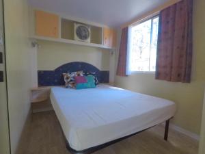 Voodi või voodid majutusasutuse Camping & Village Polvese toas