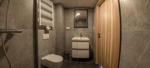 Kúpeľňa v ubytovaní Kazalnica Family&Conference Resort
