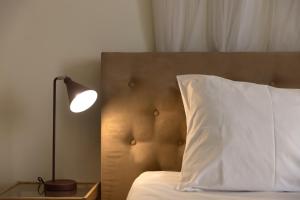 Posteľ alebo postele v izbe v ubytovaní 3BR Prime APT a breath away from the Acropolis!