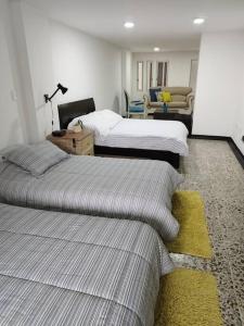 Cama o camas de una habitación en Acogedor apartamento zona Norte