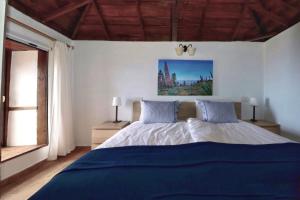 Postel nebo postele na pokoji v ubytování Casa Demetria La Palma