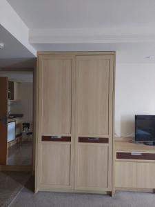 Lets Idea Hotel Flat Particular的电视和/或娱乐中心