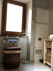 a bathroom with a shower with a large tub at Verso Sud in Sutri