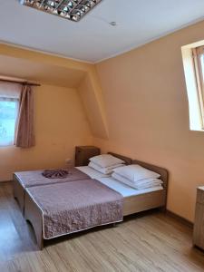 Cama o camas de una habitación en Готель АС Ясіня