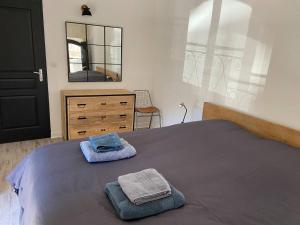 Posteľ alebo postele v izbe v ubytovaní Appartement de standing au cœur d’Avignon