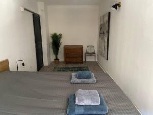 Posteľ alebo postele v izbe v ubytovaní Appartement de standing au cœur d’Avignon