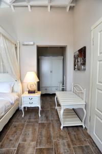 A bed or beds in a room at Alya Villa Butik Hotel