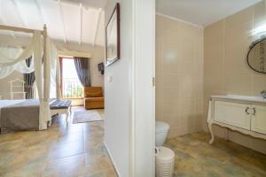 A bed or beds in a room at Alya Villa Butik Hotel