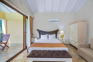 A bed or beds in a room at Alya Villa Butik Hotel