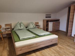 Postel nebo postele na pokoji v ubytování Saumerhof