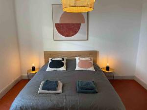 Posteľ alebo postele v izbe v ubytovaní Appartement entièrement rénové au cœur d’Avignon