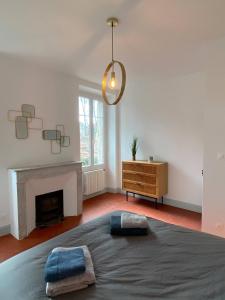 Posteľ alebo postele v izbe v ubytovaní Appartement entièrement rénové au cœur d’Avignon
