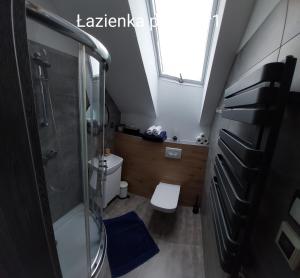 Koupelna v ubytování Kaper Rewa