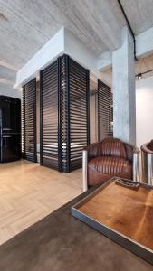 Fotografie z fotogalerie ubytování A NYC loft inspired design Studio APT in Kolonaki v Aténách