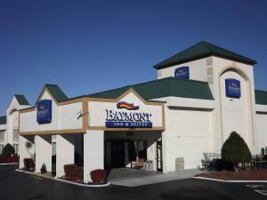 a building with a sign that reads banquet inn and suites at Baymont by Wyndham Greensboro/Coliseum in Greensboro