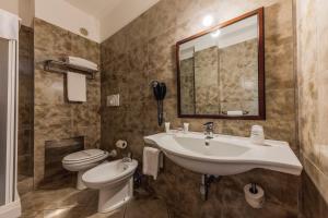 Ванная комната в Apulia Hotel Taranto Ara Solis