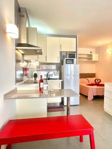 Kuchyň nebo kuchyňský kout v ubytování Apartamento Rest&Pool + 12 fotografií