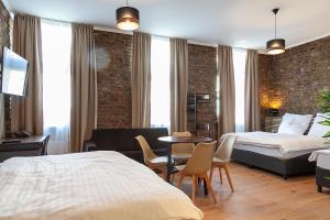 Rúm í herbergi á Hotel Soers