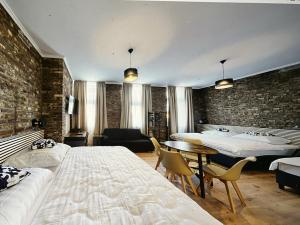 Rúm í herbergi á Hotel Soers