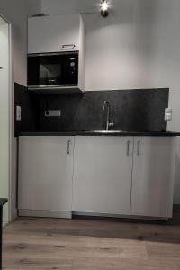 Eldhús eða eldhúskrókur á Hotel Soers