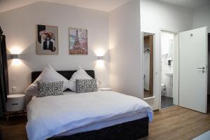 Rúm í herbergi á Hotel Soers