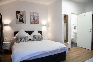 Rúm í herbergi á Hotel Soers