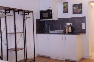 Eldhús eða eldhúskrókur á Hotel Soers