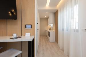 Kuchyň nebo kuchyňský kout v ubytování Incanto Boutique Suites - Mets