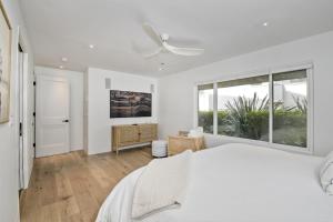 Ένα ή περισσότερα κρεβάτια σε δωμάτιο στο Oceanfront Luxury, Fully Remodeled, Five-Star +42 φωτογραφίες