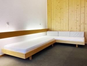 Postel nebo postele na pokoji v ubytování Arc 1600 - 2 pièces ouvert, 4 personnes, signé Charlotte Perriand