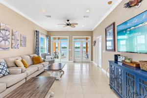 a living room with a couch and a table at Eagle's Nest in Gulf Shores