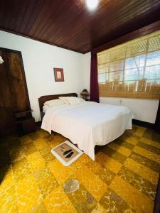 เตียงในห้องที่ Hotel Casa Chapultepec