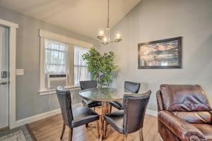 a dining room with a table and chairs at Charming Cheyenne Home about 1 Mi to Downtown! in Cheyenne