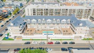 an aerial view of a large building with a parking lot at Impala Suites in Ocean City