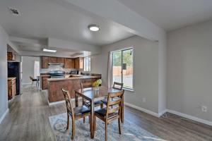 a kitchen and dining room with a table and chairs at Pet-Friendly Sacramento Home Less Than 5 Mi to Dtwn! in Sacramento