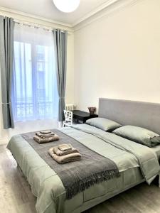 Fotografia z galérie ubytovania Arc de Triomphe-Foch: appartement spacieux moderne v Paríži