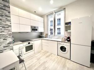 Fotografia z galérie ubytovania Arc de Triomphe-Foch: appartement spacieux moderne v Paríži