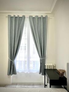 Fotografia z galérie ubytovania Arc de Triomphe-Foch: appartement spacieux moderne v Paríži