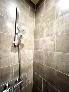 Fotografia z galérie ubytovania Arc de Triomphe-Foch: appartement spacieux moderne v Paríži