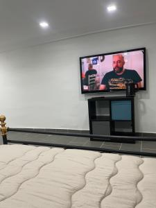 A television and/or entertainment centre at Holiday apartament