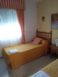 Posteľ alebo postele v izbe v ubytovaní CARMEN MOLINA EDIFICIO ESMERALDA + 20 fotografií
